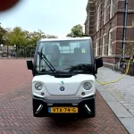 Centrumgroep met watersproeiwagentje