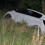 Auto in sloot Bakel